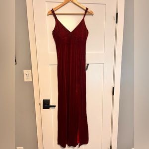 NWT Red velvet floor length dress, with mid thigh slit. Adjustable straps.